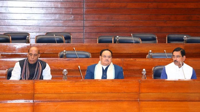 Defence Minister Rajnath Singh, BJP National President JP Nadda with Union Minister for Parliamentary Affairs, Coal and Mines, Pralhad Joshi during the BJP Parliamentary Executive Committee meeting ahead of the winter session of the Parliament, in New Delhi on Sunday | ANI Photo