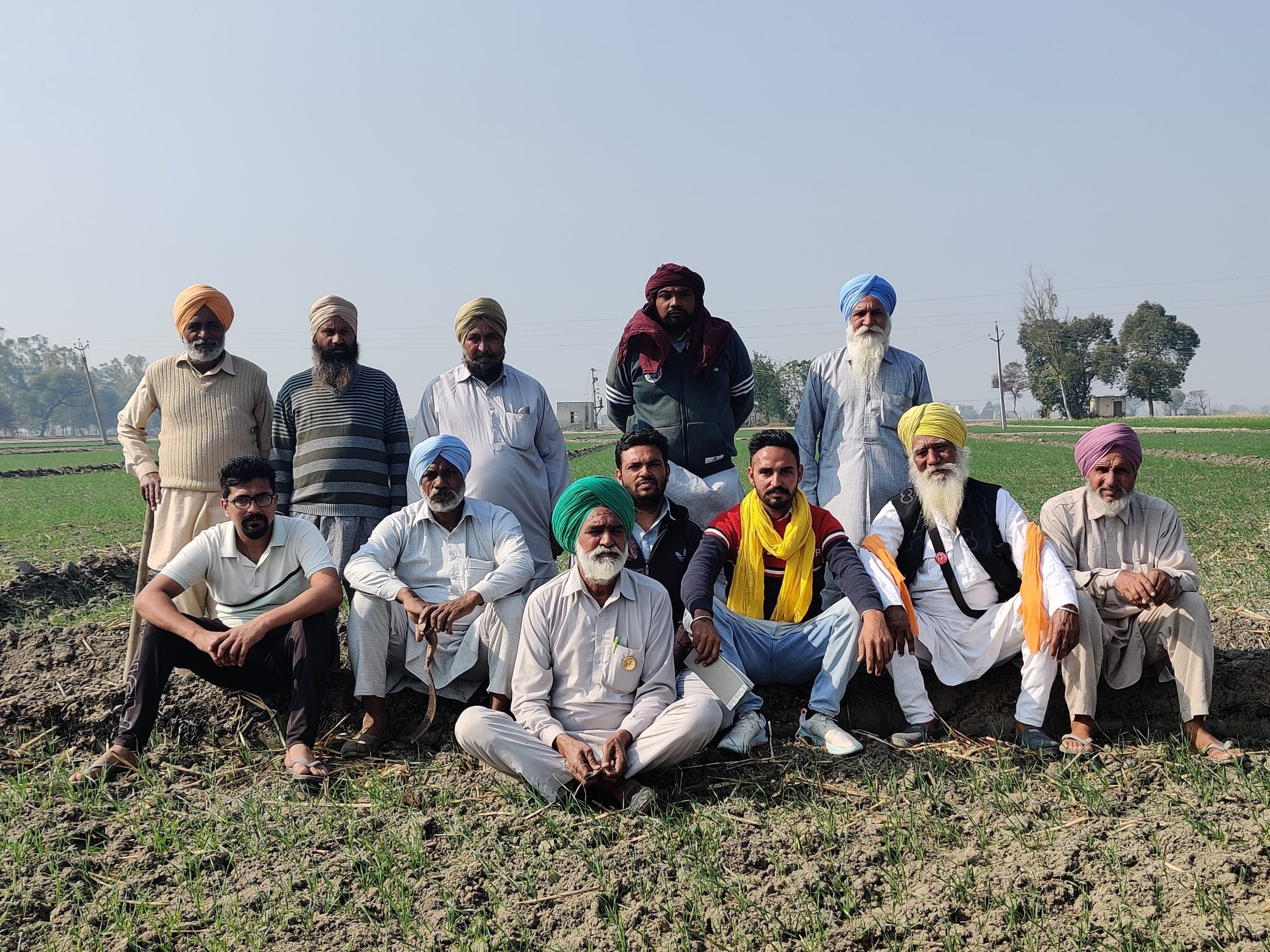 Sukhdev Singh (in green turban), sarpanch of Ubbawal village in Sangrur district, with other local farmers | Urjita Bhardwaj | ThePrint