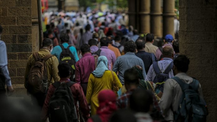 Commuters exit the Chhatrapati Shivaji Maharaj Terminus railway station in Mumbai | Representational image | Photo: Dhiraj Singh | Bloomberg