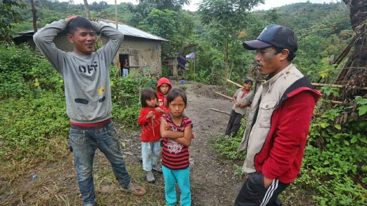 Mangboi Zou (extreme left) was working in the fields when he heard explosions | Photo: Praveen Jain/ThePrint