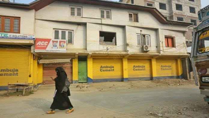 A broken window at the building in Hyderpora, in which the two civilians were shot dead | Photo: Praveen Jain/ThePrint