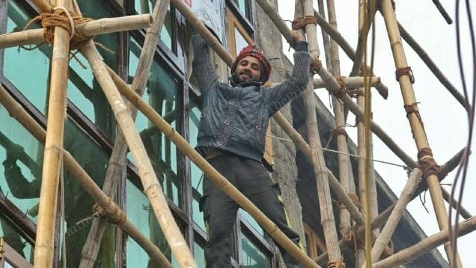 Labourers from Bihar working at an under-construction mosque in Abiguzar area of Lal Chowk in Srinagar | Photo: Praveen Jain/ThePrint