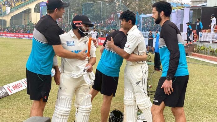 Ajaz Patel and Rachin Ravindra congratulated by their New Zealand teammates after the end of play on Day 5 of the Test between India and New Zealand | ANI