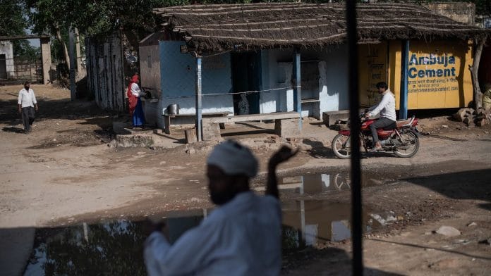 Villagers near a tea stall amid lockdown in Alwar district, Rajasthan | Representational image | Photo: Rebecca Conway/Getty Images via Bloomberg
