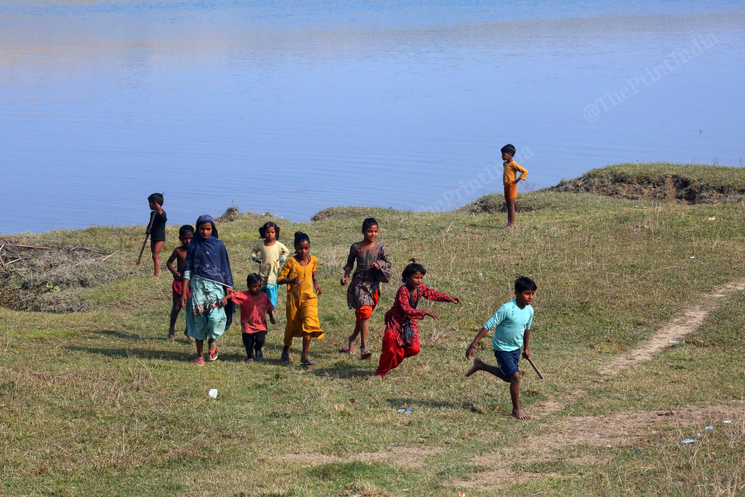 Children's playing near Saryu Nahar Pariyojna | Photo: Praveen Jain| ThePrint