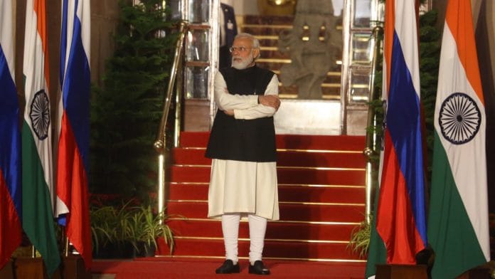 Prime Minister Narendra Modi waiting to receive Russian President Vladimir Putin at Hyderabad House| Photo: Praveen Jain | ThePrint
