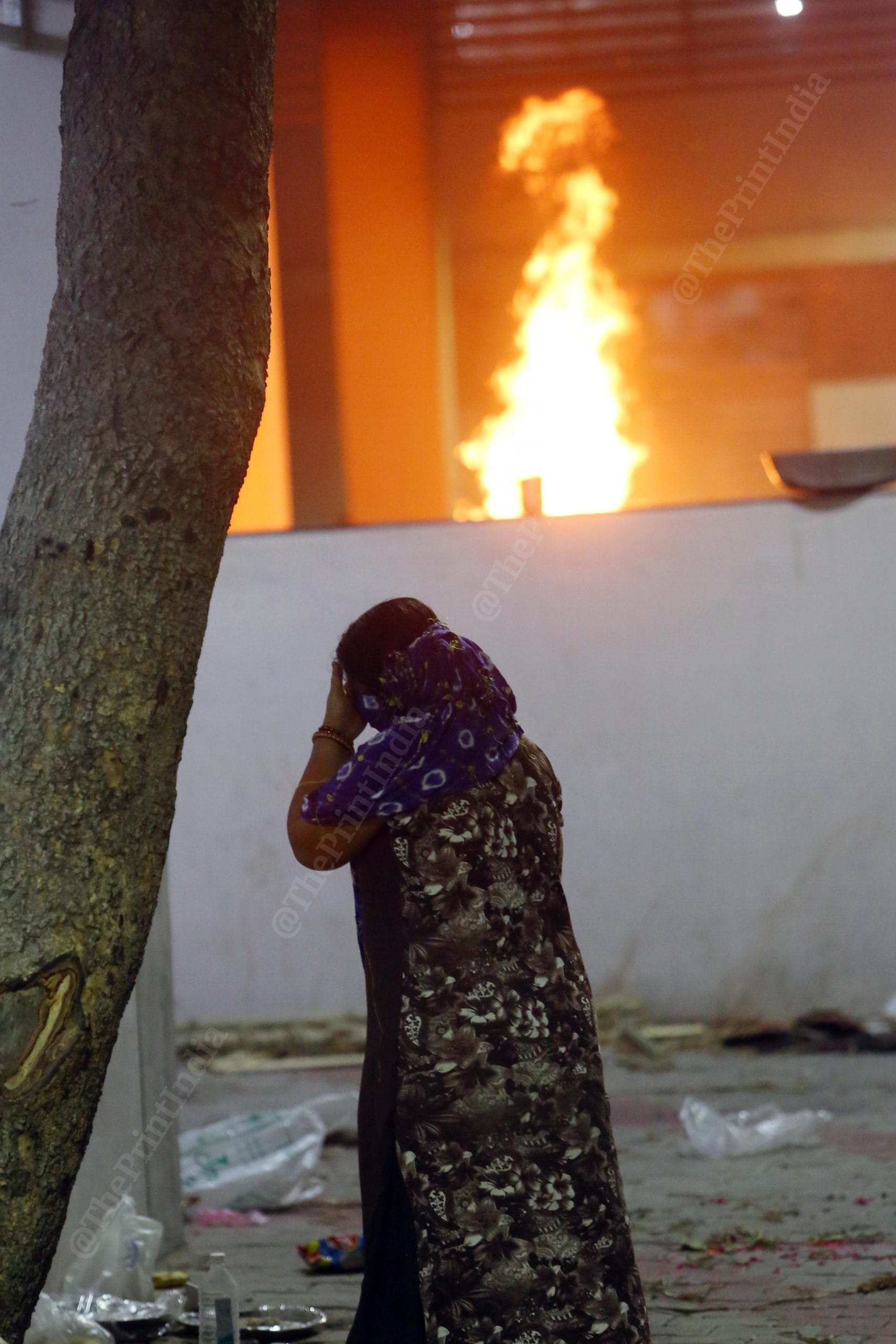 A woman grieves after the death of a family member at Isanpur crematorium | Photo: Praveen Jain | ThePrint