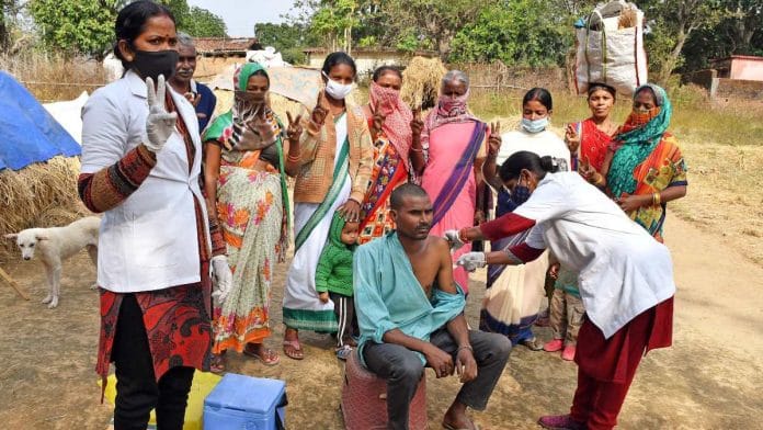 A man being given the Covid-19 vaccine at the Bogai Bera panchayat near Ranchi on 6 December | ANI