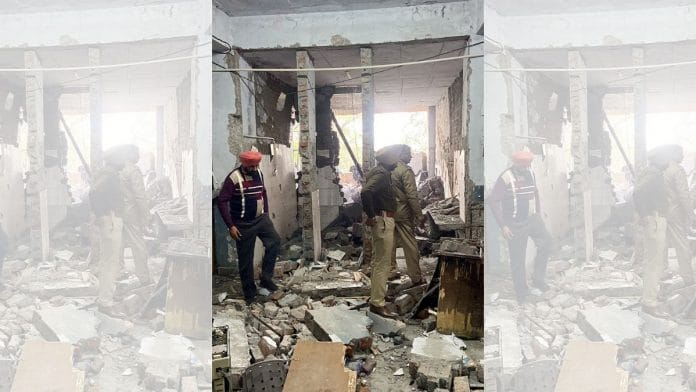 Police personnel inspect the scene of the blast. | ANI