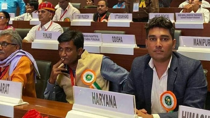 Yuvraj Sharma (R) at an award ceremony in Delhi on National Panchayati Raj Day | Photo by special arrangement