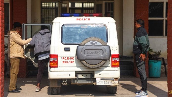 The accused getting into a police vehicle in Palwal Monday | Photo: Manisha Mondal | ThePrint