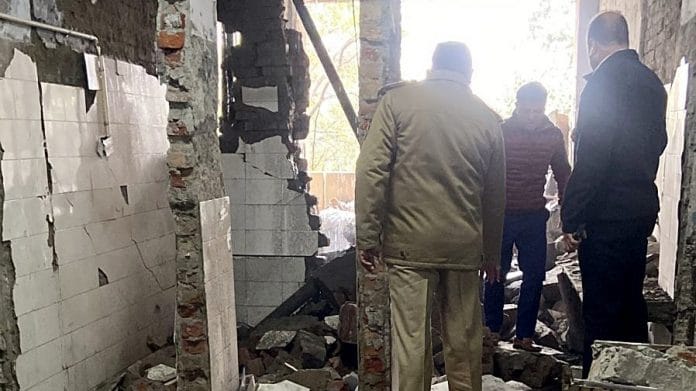 Police personnel inspect the site after the blast at the Ludhiana court complex, on 23 December 2021 | ANI Photo