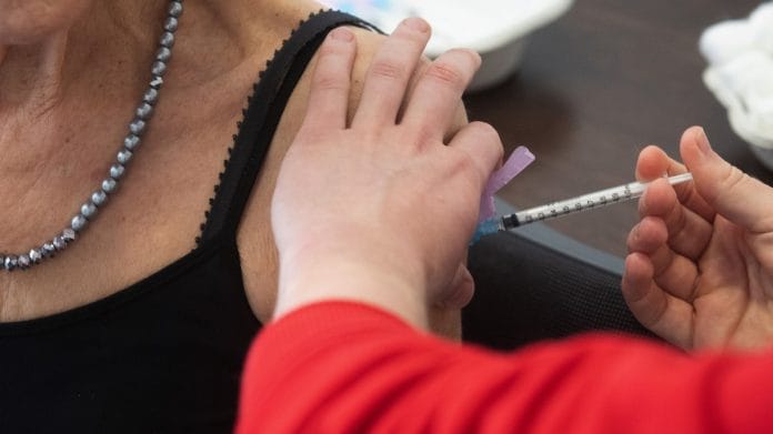 A person receives a dose of Covid-19 vaccine | Representational image | Bloomberg