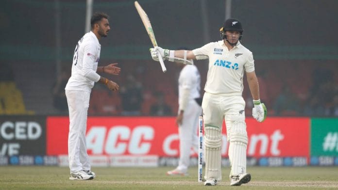 New Zealand's Tom Latham celebrates his half-century during the first Test in Kanpur on 26 November. | ANI