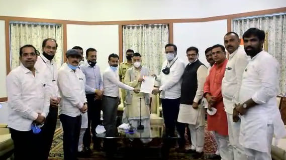 File photo of the 12 MLAs meeting the Governor after their suspension. | ANI