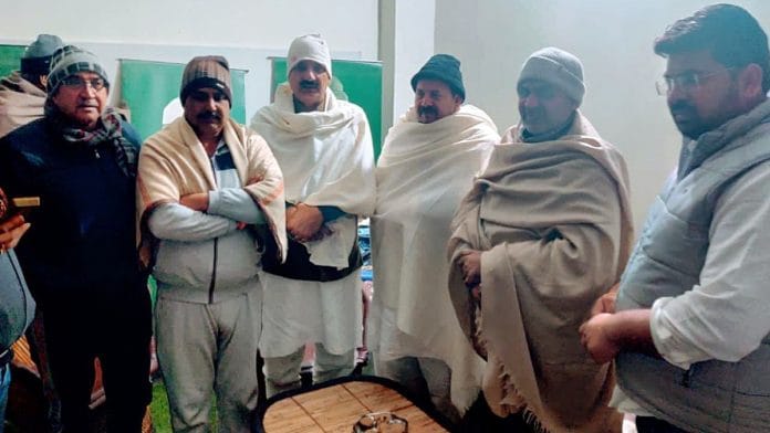 Union minister Sanjeev Balyan (3L) meets Bharatiya Kisan Union president Naresh Tikait (3R) Monday, ahead of the Uttar Pradesh assembly elections | ANI