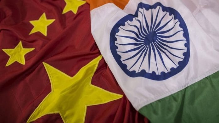 The national flags of China and India | Representational Image | Photo: Dhiraj Singh | Bloomberg