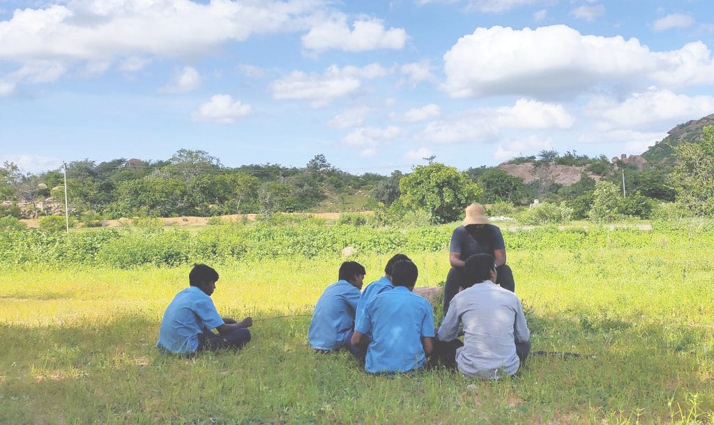 Uday Chauhan and child actors take a break while shooting. Photo Credit: Special Arrangement