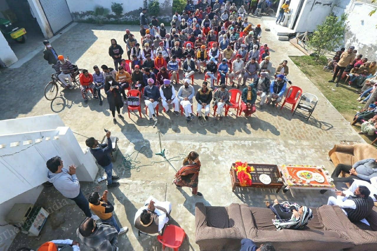 Congress candidate Malvika Sood and her brother Sonu Sood (standing on the side )campaigning for her constituency Khukhrana village in Moga | Praveen Jain | ThePrint