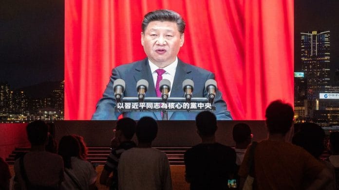 A screen shows Xi Jinping speaking at a light show marking the centenary of the Chinese Community Party | Representational image | Bloomberg