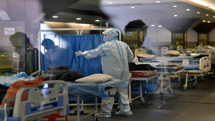 File photo of a health worker in an isolation ward for Covid-19 patients in New Delhi | ANI