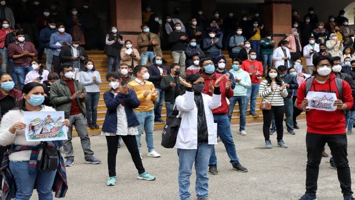 File photo of resident doctors of Safdarjung Hospital and Lady Hardinge Hospital protesting against the delay in the National Eligibility Entrance Test (NEET) PG Counselling in New Delhi | ANI