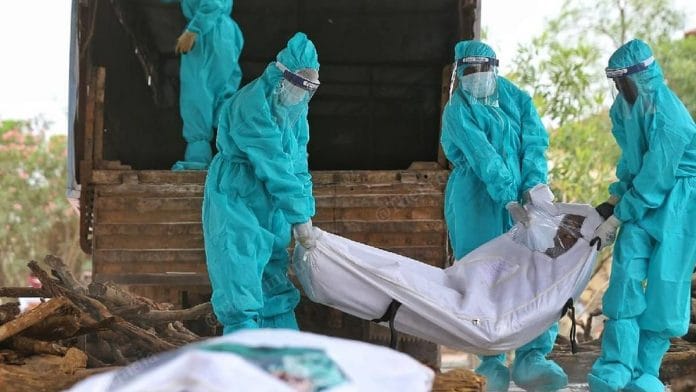 Representational Image | File photo of dead bodies of Covid patients being taken for last rites | Suraj Singh Bisht | ThePrint
