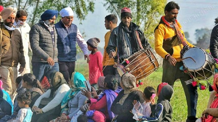 Congress cabinet minister and hockey legend Pargat Singh campaigning in his constituency at Jandiala village in Jalandhar Cantonment. | Praveen Jain | ThePrint