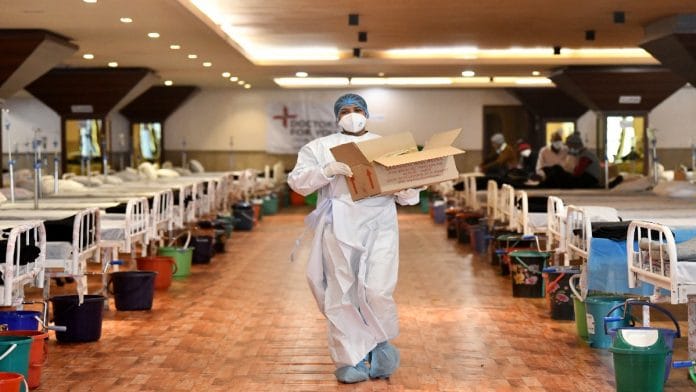 Representational photo of a healthcare worker in an isolation ward for Covid patients in Delhi | ANI