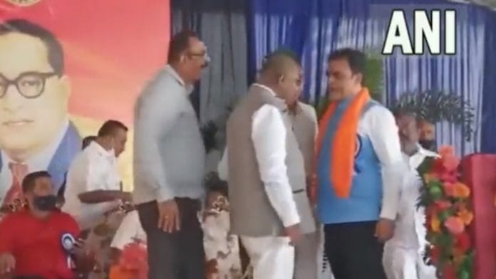 Congress MP DK Suresh (centre) and BJP minister CN Ashwathnarayan (left) at the public event in Karnataka's Ramanagara | Twitter/@ANI