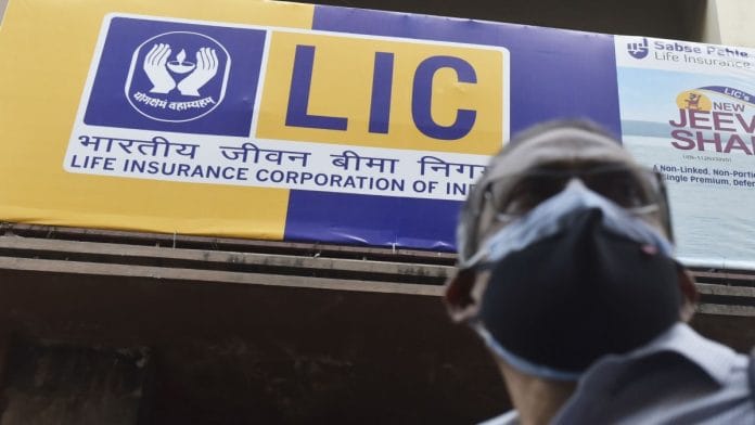 A man pass by a building of LIC in Kolkata | Photographer: Getty Images/NurPhoto via Bloomberg