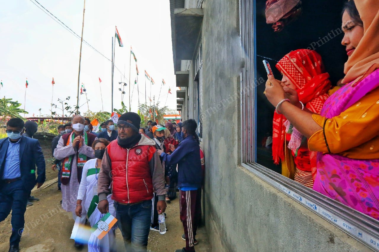 Women take photos of former Manipur CM and Congress leader Okram Ibobi Singh at a rally in Wangkhem constituency | Photo: Praveen Jain | ThePrint