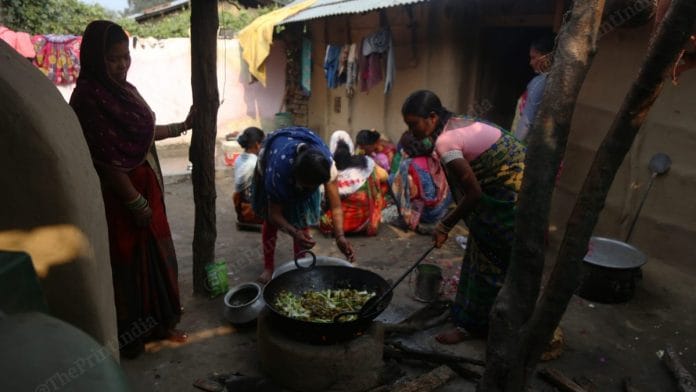 A wedding feast being prepared for all residents of Raniyapur village | Photo: Manisha Mondal | ThePrint