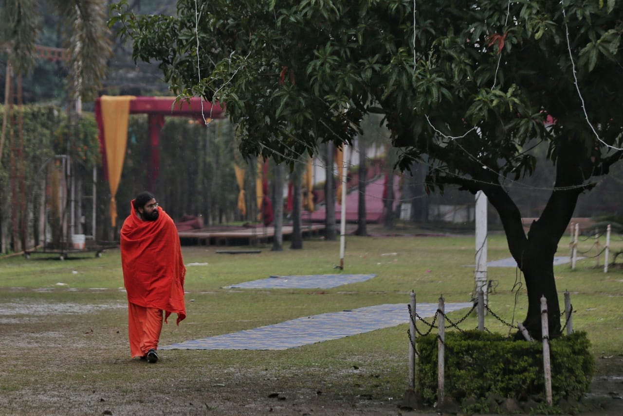 Swami Parmanand walks towards an ashram in Haridwar. | Photo: Suraj Singh Bisht/ThePrint