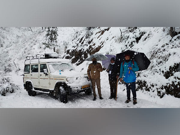 Uttarakhand polls: Poll officials brave harsh weather to reach booths