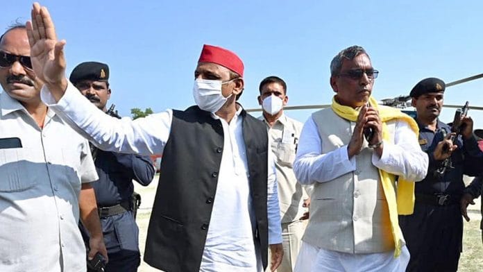 File photo of O.P. Rajbhar (right) with SP chief Akhilesh Yadav | ANI