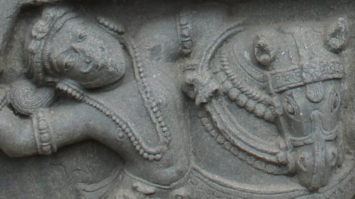 A 12th century Indian inscription showing a cavalryman in battle | Wikimedia Commons