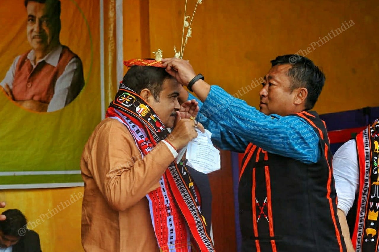 Union Minister Nitin Gadkari being felicitated with a Tangkhul Naga headpiece at BJP rally in Ukhrul at Manipur | Praveen Jain | ThePrint