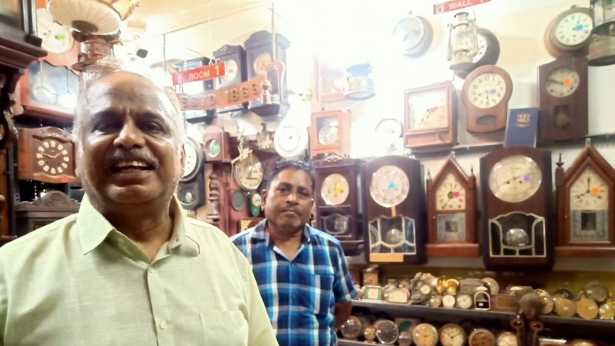 Robert Kennedy and his clocksman V. Nagaraj with their collection of clocks. | Photo: Anusha Ravi Sood | ThePrint