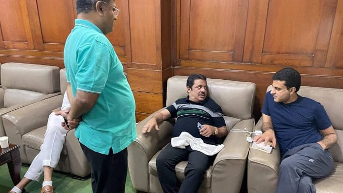 Congress MLAs at the Karnataka Legislative Assembly Friday during their protest demanding minister K.S. Eshwarappa's resignation | ANI