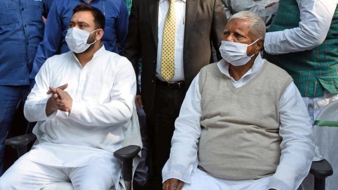 A file photo of RJD chief Lalu Prasad and his son and party leader Tejashwi Yadav. | Photo: ANI