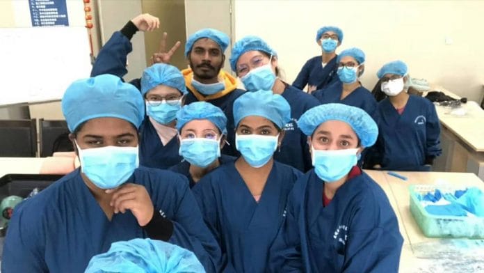 Kirti Pathak (extreme right), a medical student at a Chinese university, with classmates in 2019 | By special arrangement