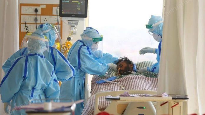File photo of nurses caring for a COVID-19 patient in the intensive care unit (I.C.U.) of a hospital | Photo: Suraj Singh Bisht | ThePrint