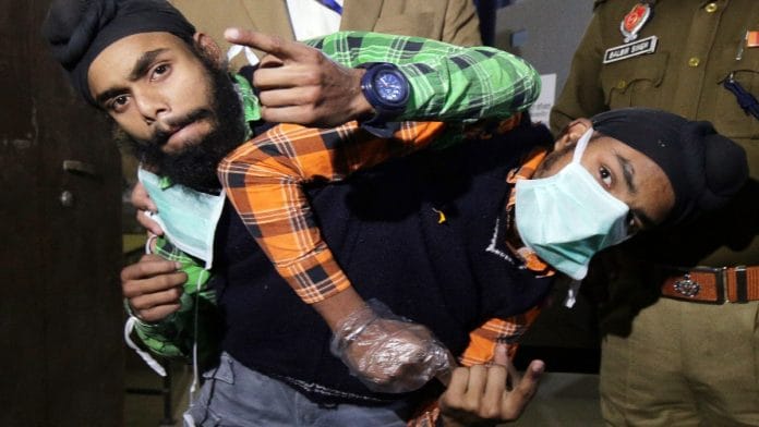Conjoined twins Sohna and Mohna showing their ink marked fingers after casting their votes for the Punjab Assembly elections, at Manwal, in Amritsar on Sunday | ANI