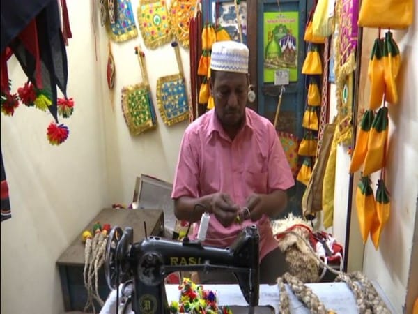 Madurai exemplifies communal harmony as Muslim tailors make costumes for Kallazhagar festival