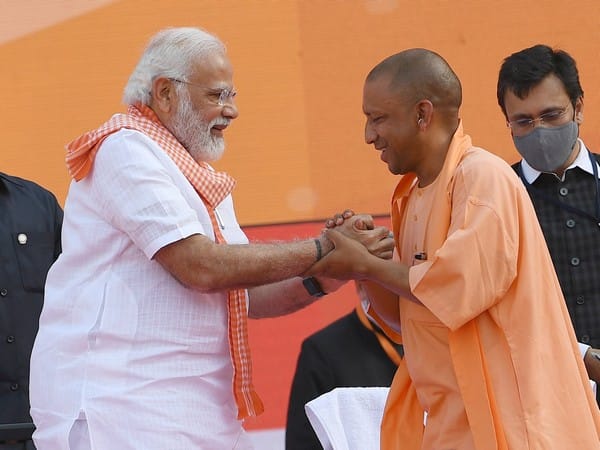 PM Modi greets CM Yogi Adityanath, UP ministers on taking oath