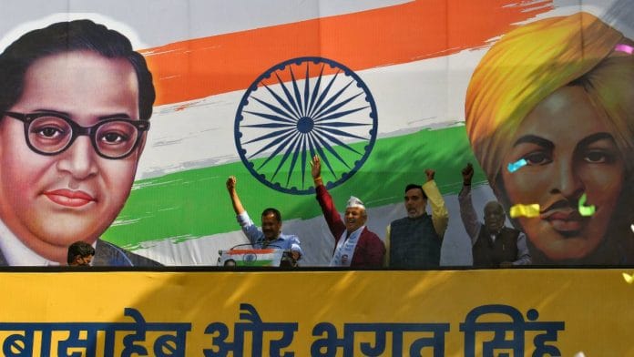 Arvind Kejriwal, along with AAP leaders Manish Sisodia and Gopal Rai, greets supporters after AAP's victory in Punjab | ANI