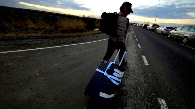 Sean Penn shared a picture of him walking towards the Polish border