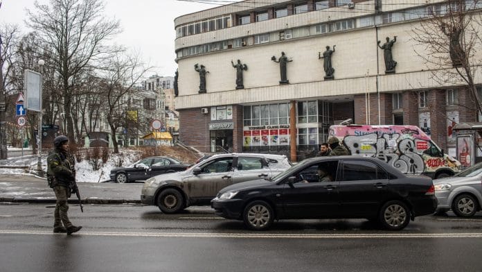 Representational image | A Ukraine's Territorial Defense check vehicles passing through a checkpoint in Kyiv on 1 March 2022 | Photo: Erin Trieb | Bloomberg