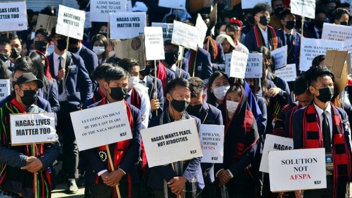 People holding placards attend a mass rally in protest against Armed Forces Special Power Act in Kohima | File image | ANI